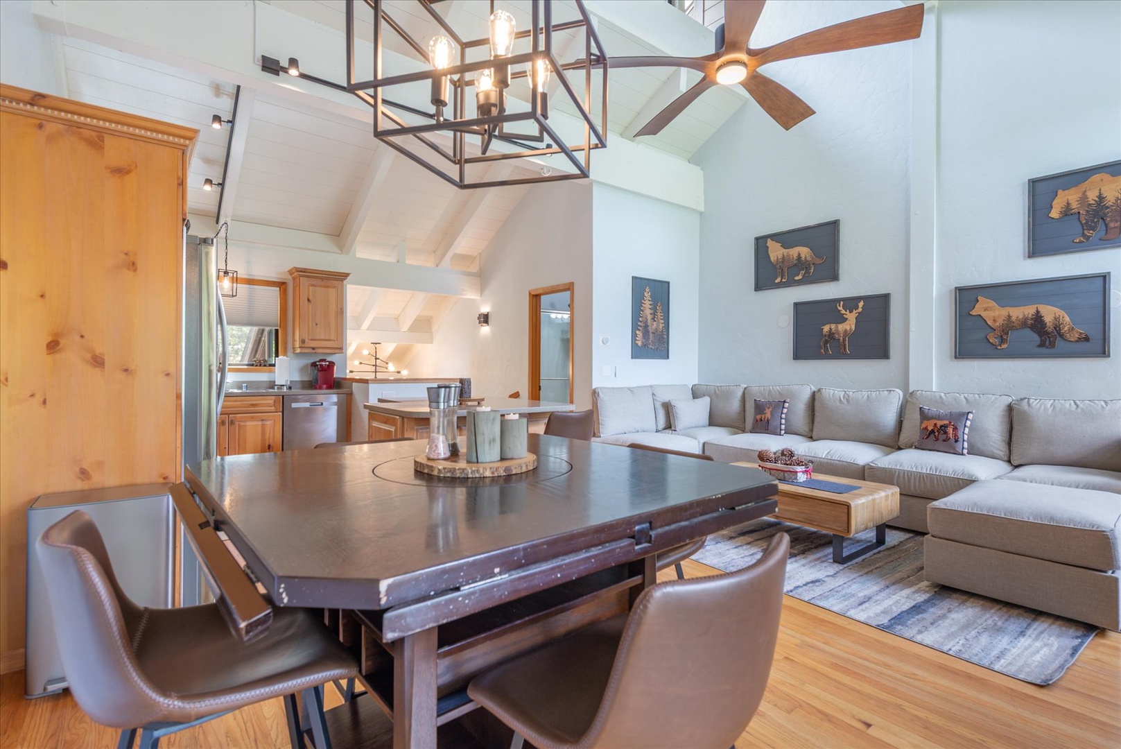 Unwind in your spacious open-concept retreat, where soaring vaulted ceilings and rustic-chic details create a warm, inviting atmosphere perfect for relaxing after a day of mountain adventures.