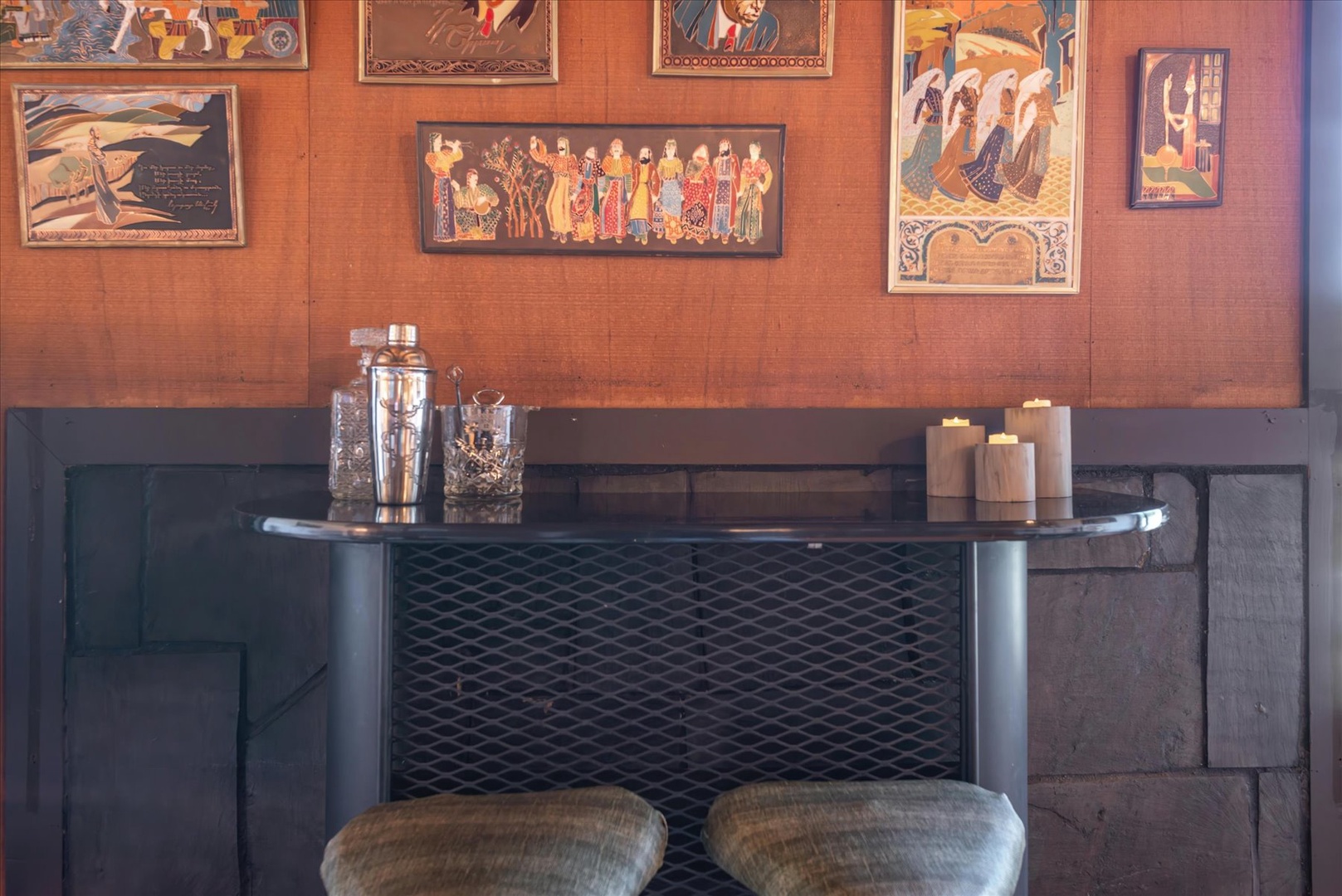 Step into your own private bar corner, where vintage artwork meets classic cocktail culture for unforgettable evening conversations.