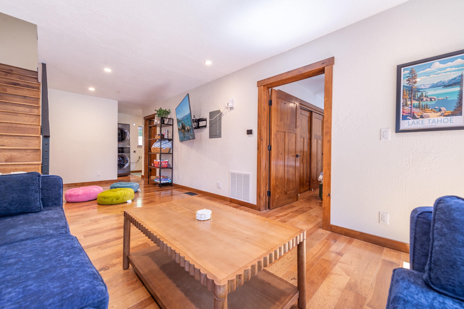 Unwind in your cozy living space with wood floors, comfortable seating, and thoughtful touches that make this feel like home.