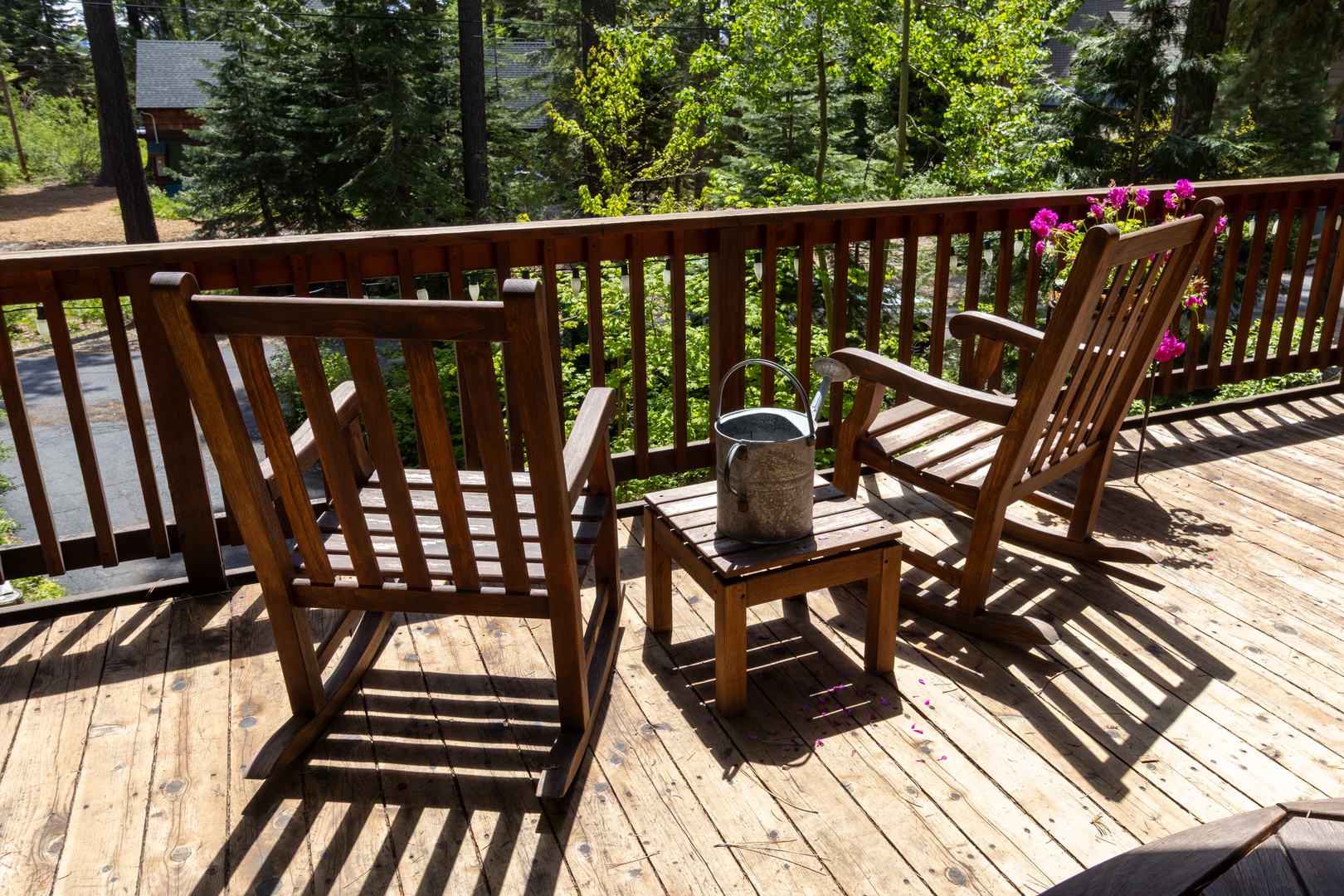 Settle into your private deck with morning coffee, surrounded by towering pines and vibrant blooms, where birdsong and gentle breezes become your daily soundtrack.