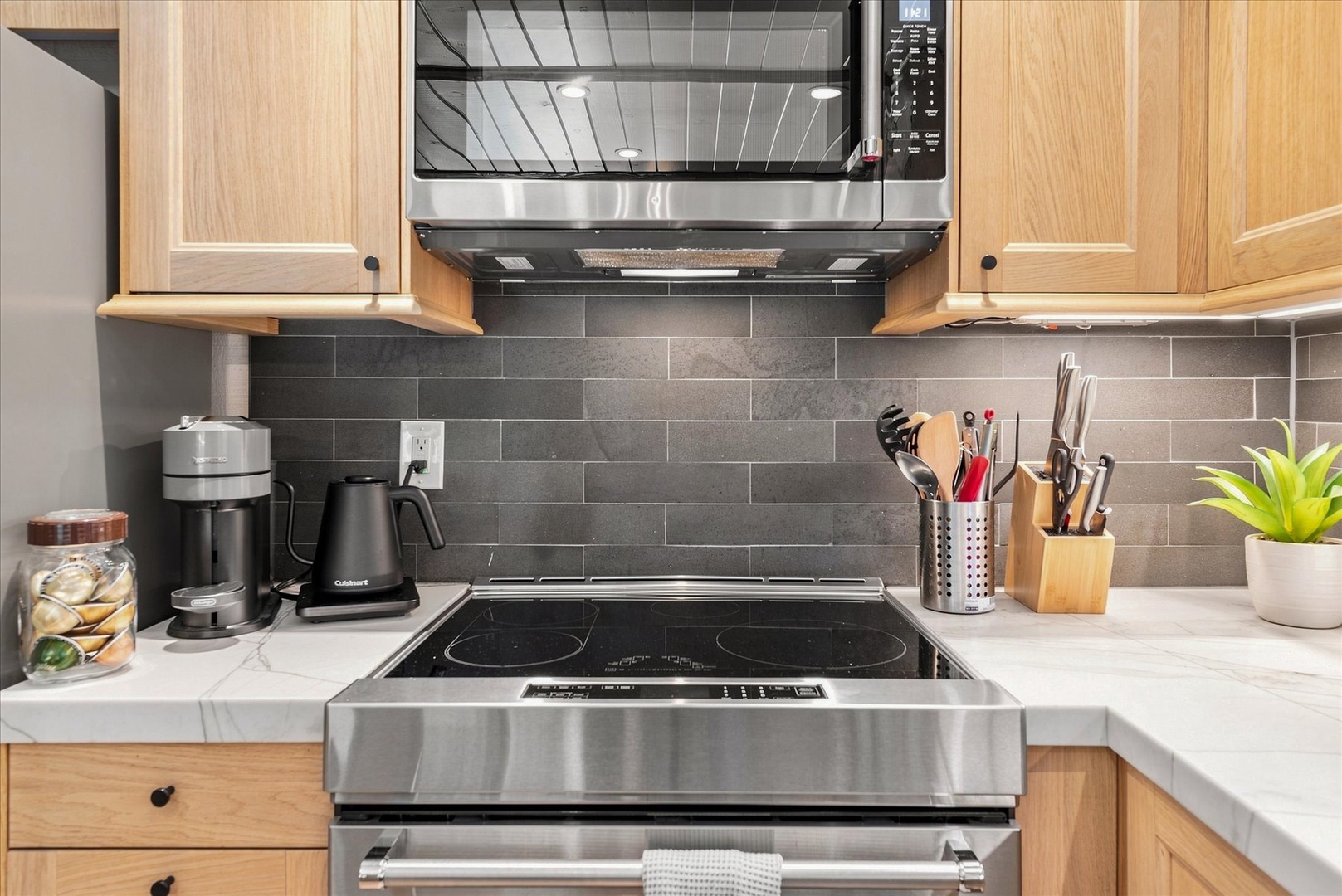 Feel right at home making meals in with the well-equipped kitchen.