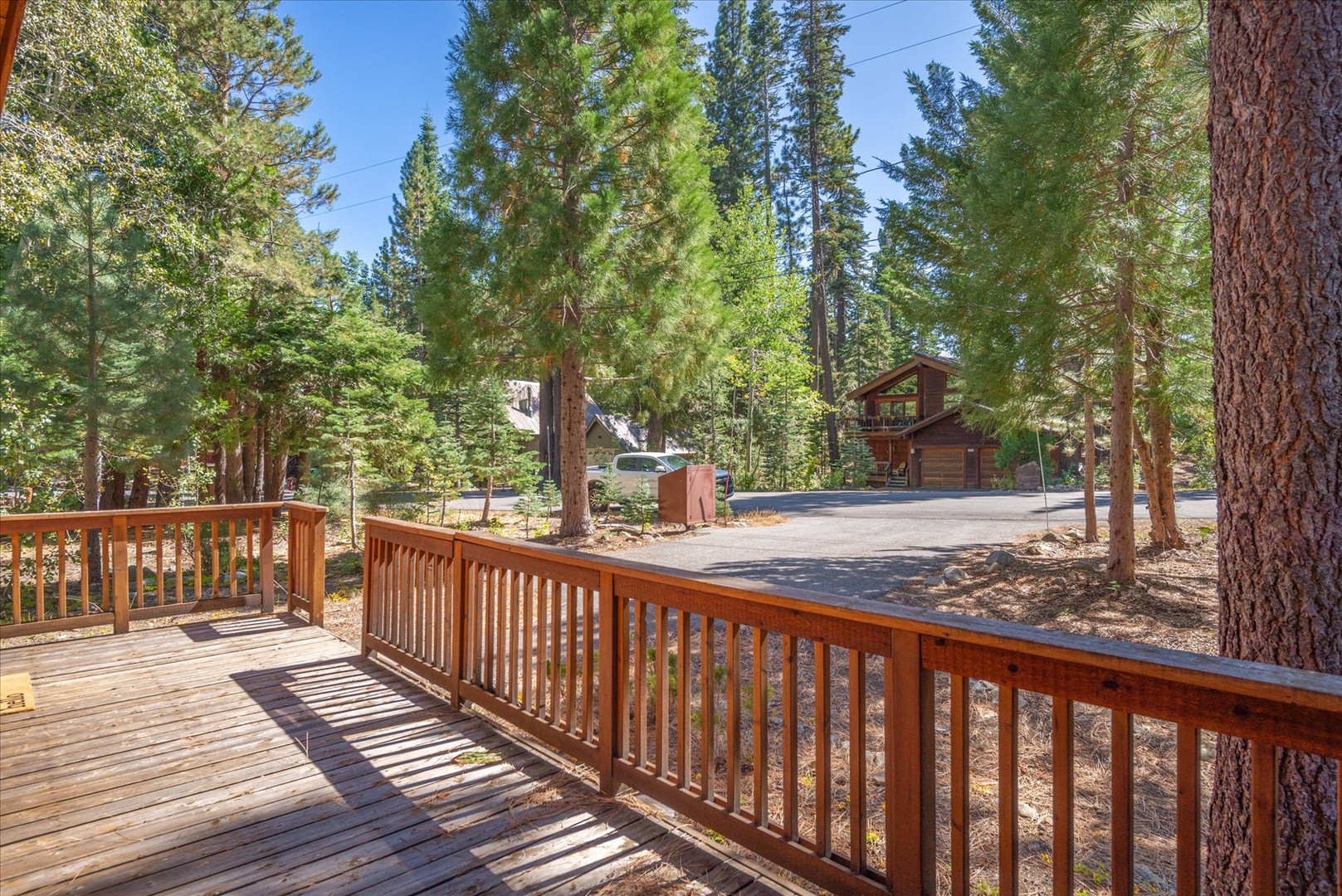 Your sunny font deck overlooking the driveway and peaceful neighborhood.