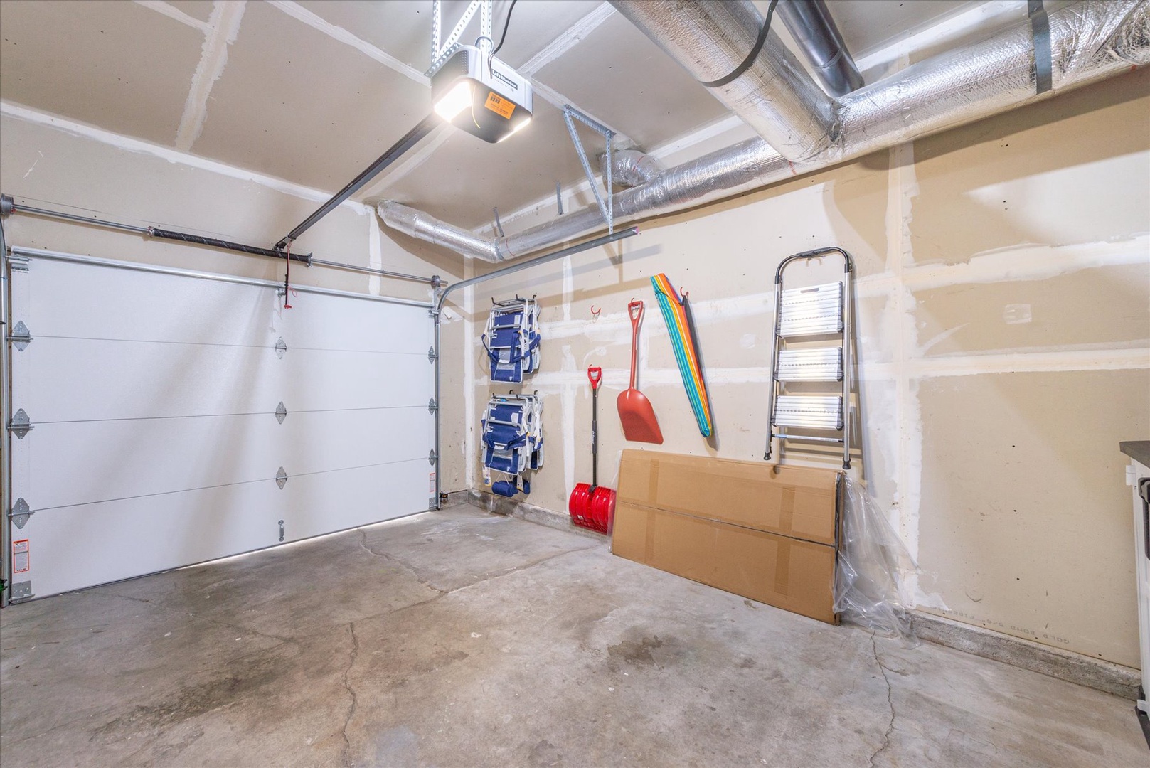 Spacious garage with organized storage solutions and easy access for your convenience during your stay.