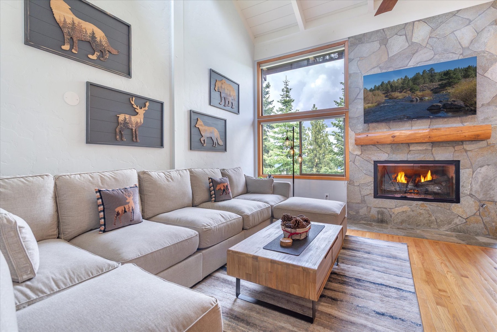 There's room for everyone on this couch–settle in for a movie on the large smart TV, enjoy the fireplace, and take in the mountain views.