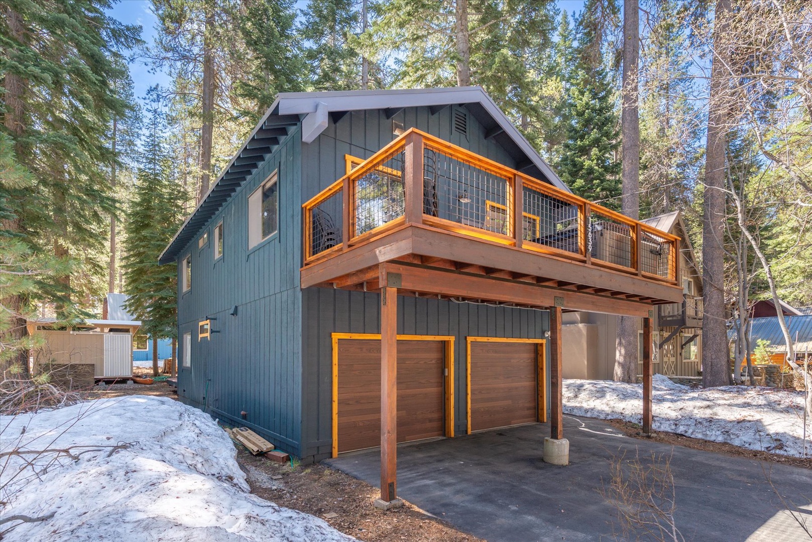 This modern Donner Lake house is perfectly situated in a cozy mountain neighborhood, great for walks to the lake and enjoy the scenery.