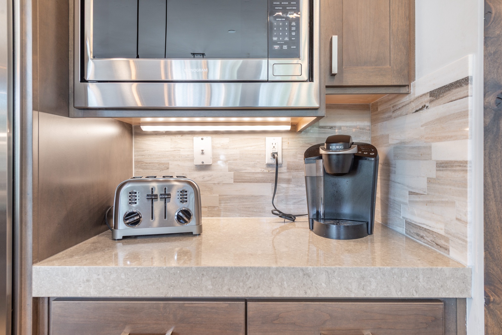 Your fully equipped kitchen features modern appliances including a Keurig coffee maker and toaster for perfect mornings.
