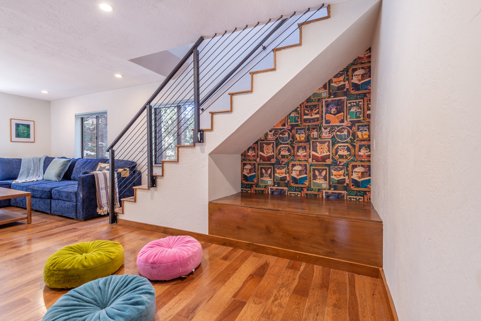 Another view of the common area and your under-the-stairs reading nook.