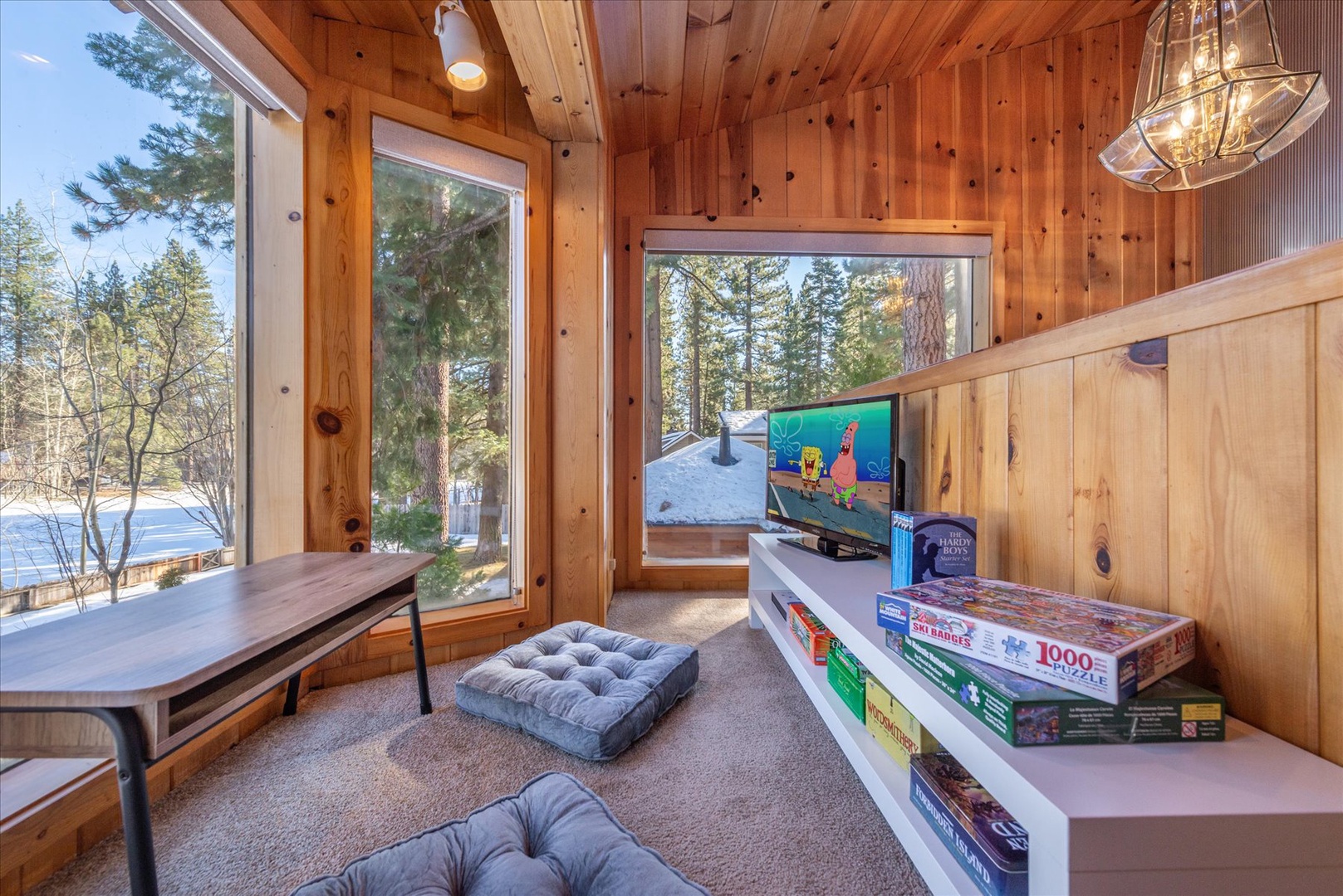 Games and books galore! Kids will love having their own space next to panoramic windows.