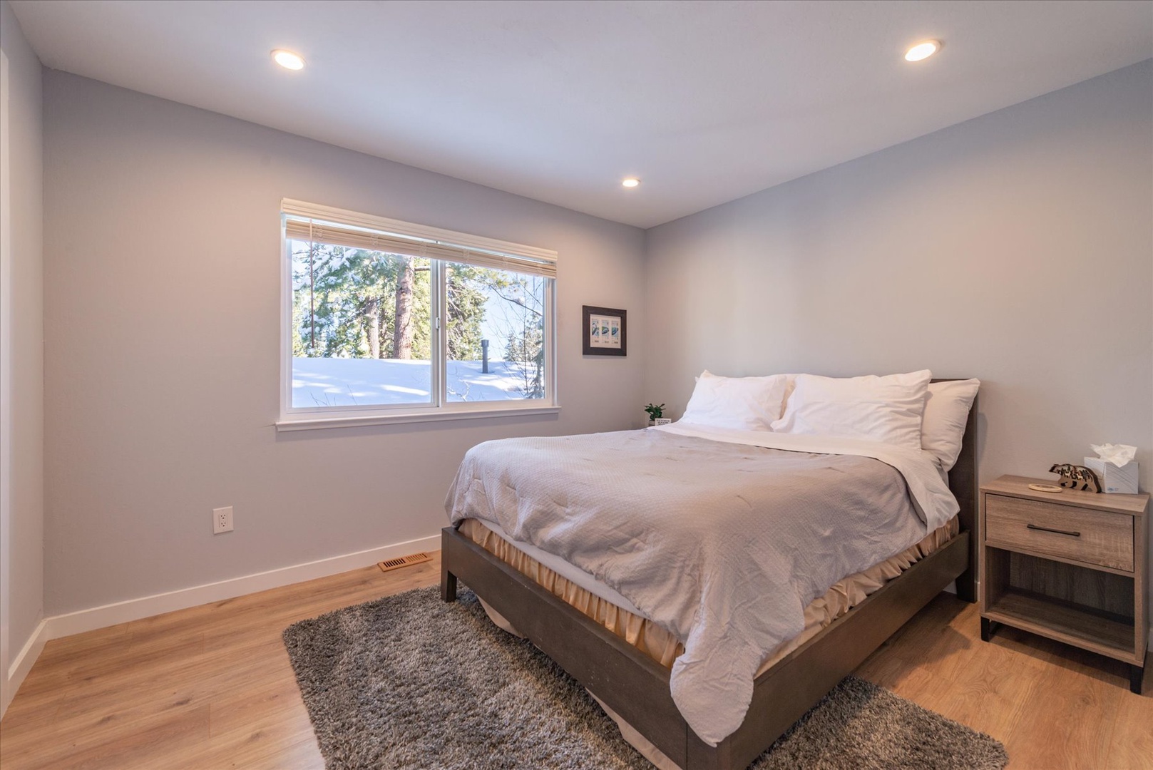 Step away into your secondary bedroom, fully furnished with a comfortable queen sized bed, ready for your night in.