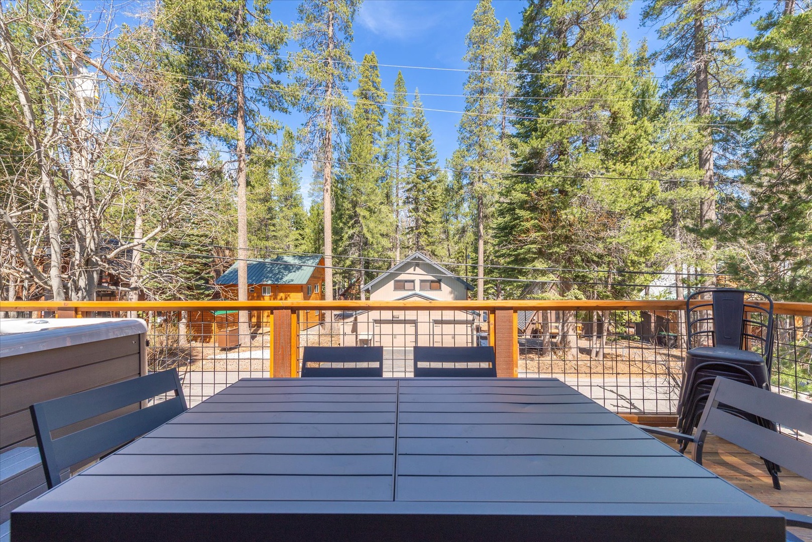 Step onto your private deck with forest views and enjoy outdoor dining surrounded by towering pines and mountain tranquility.