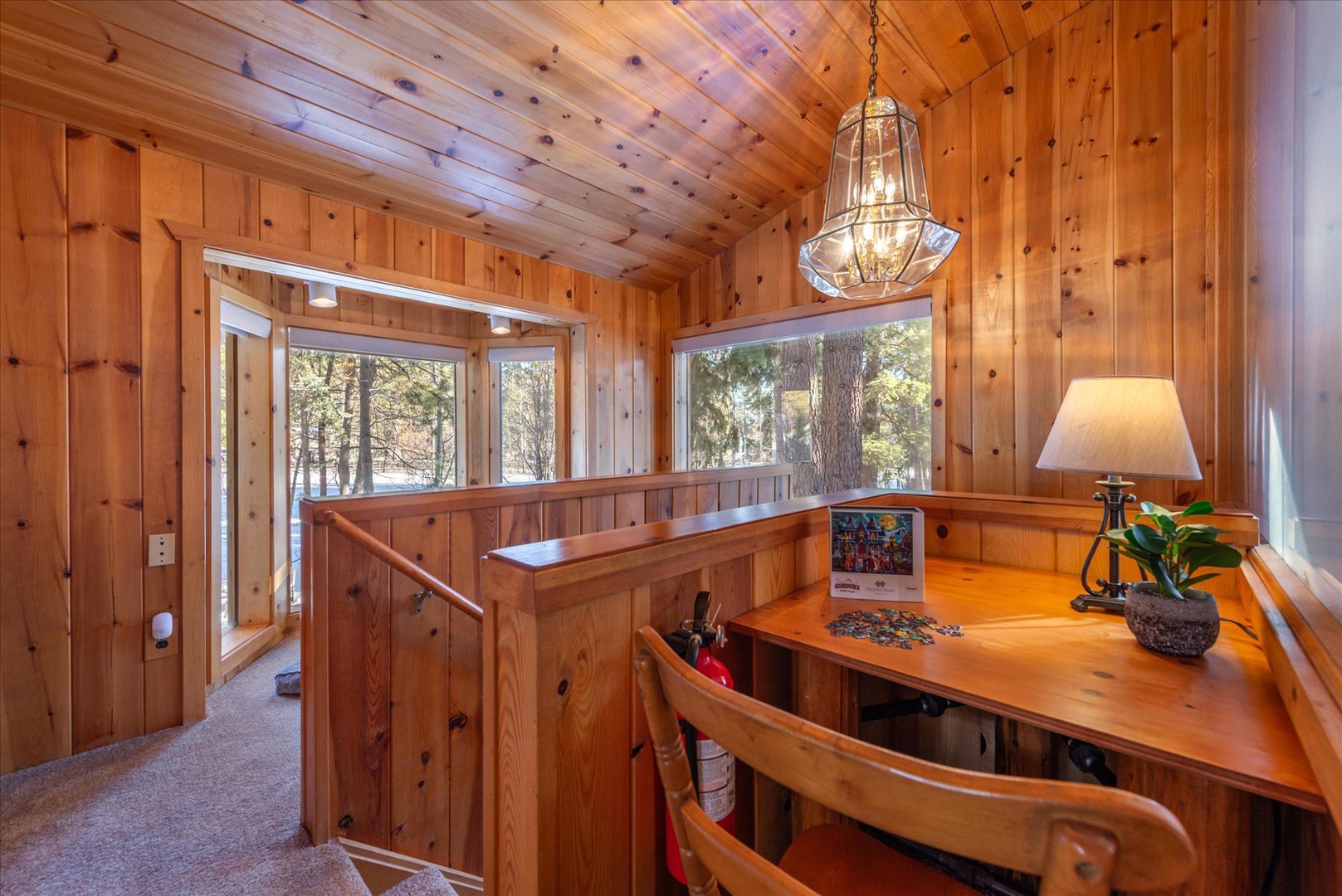 Have a quiet moment reading or completing a puzzle while natural light streams through nearby windows.