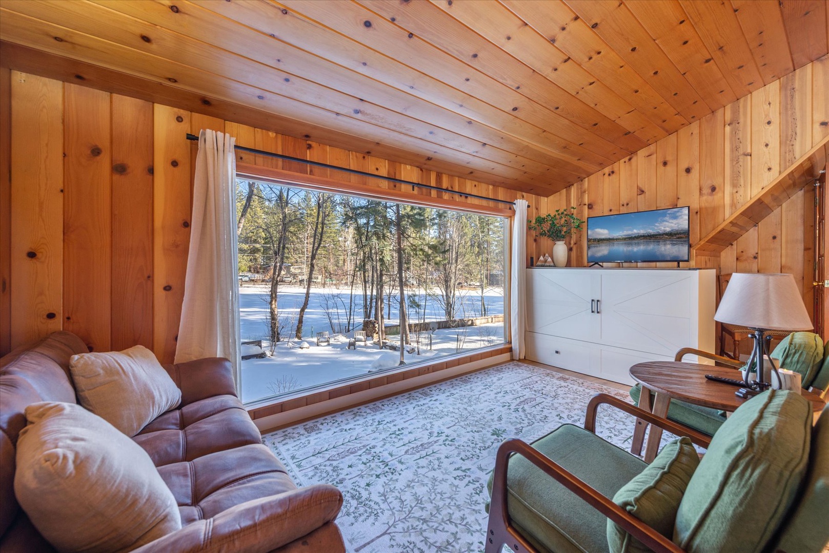 Stream your favorite movie from the comfort of this master bedroom suite.