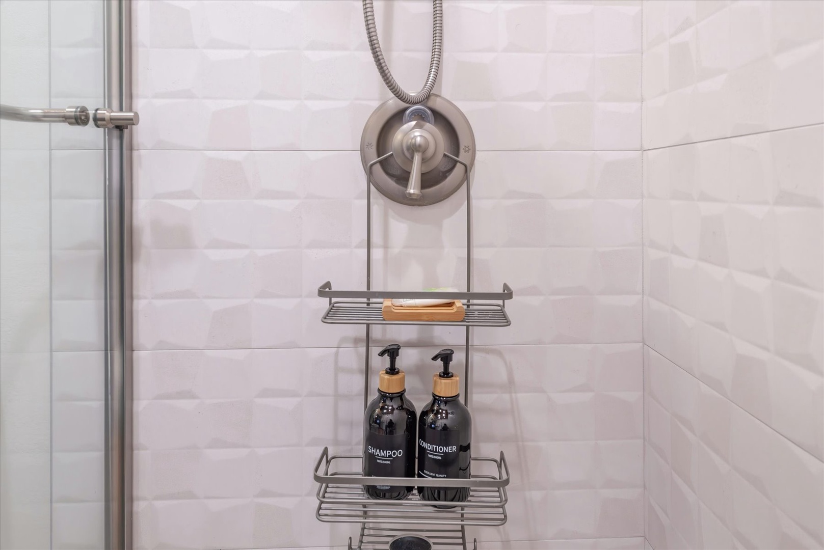 Your private shower features premium toiletries and thoughtful storage, creating a spa-like retreat for refreshing starts to your day.