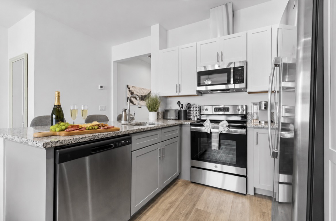 Your modern kitchen awaits with sleek stainless appliances, granite counters, and everything you need to cook up vacation memories—or just uncork that bubbly and toast to relaxation.