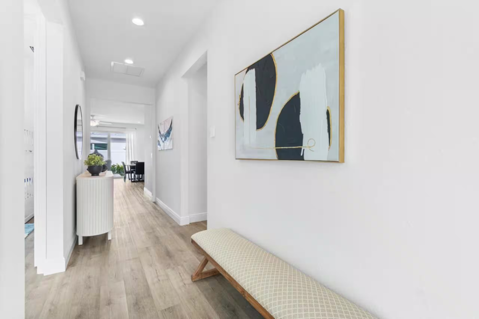 Bright, welcoming hallway with elegant décor and modern touches guiding you through your spacious retreat.