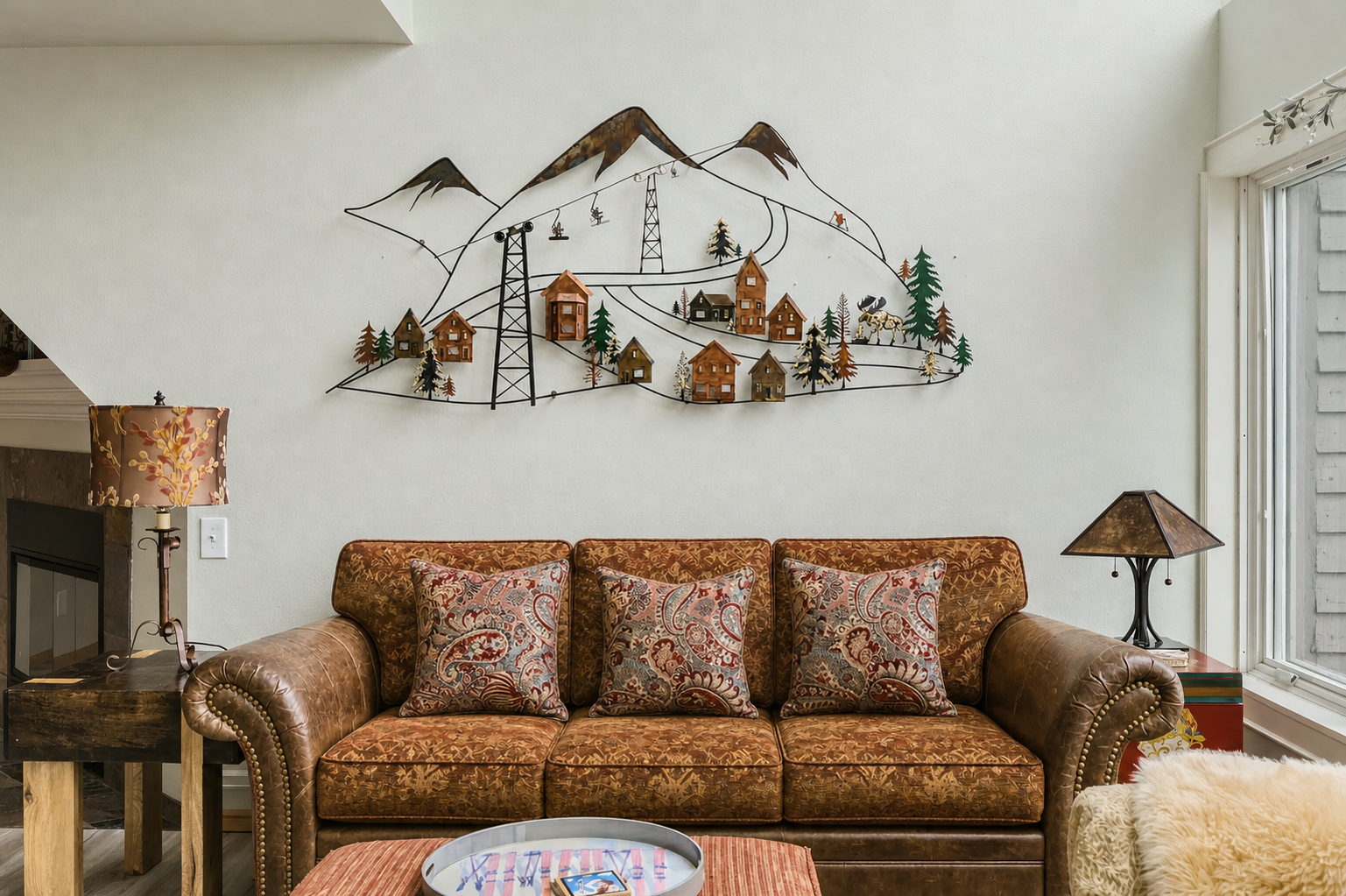 Sink into your leather sofa and admire the mountain charm, where every detail invites you to unwind and feel at home in this cozy alpine retreat.