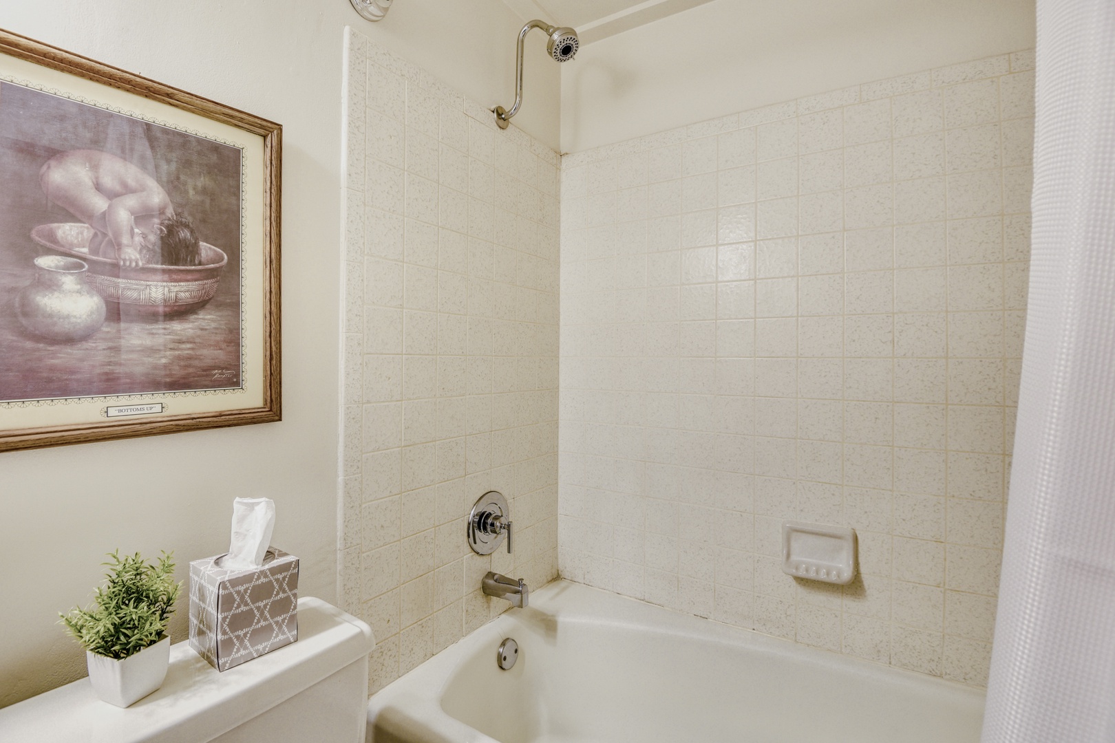 Unwind in your private bathroom with a relaxing soak in the full-size tub after exploring the area.