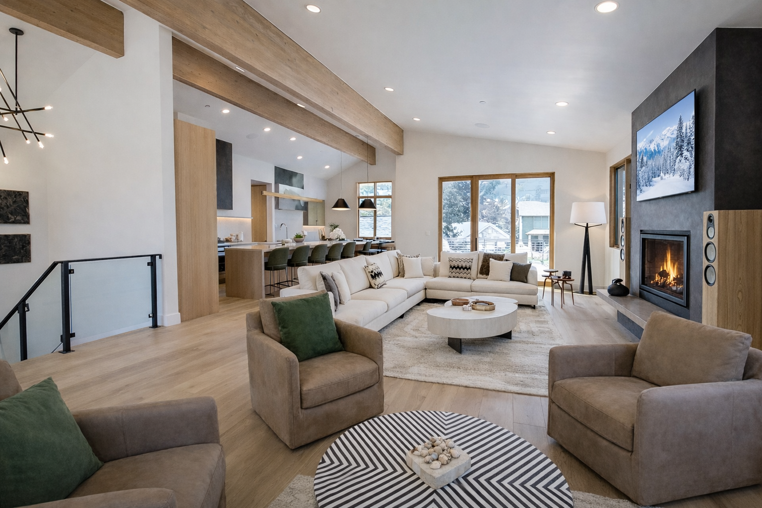 Unwind in your spacious open living area where exposed beams meet modern comfort, a crackling fireplace awaits, and mountain views frame your perfect retreat.