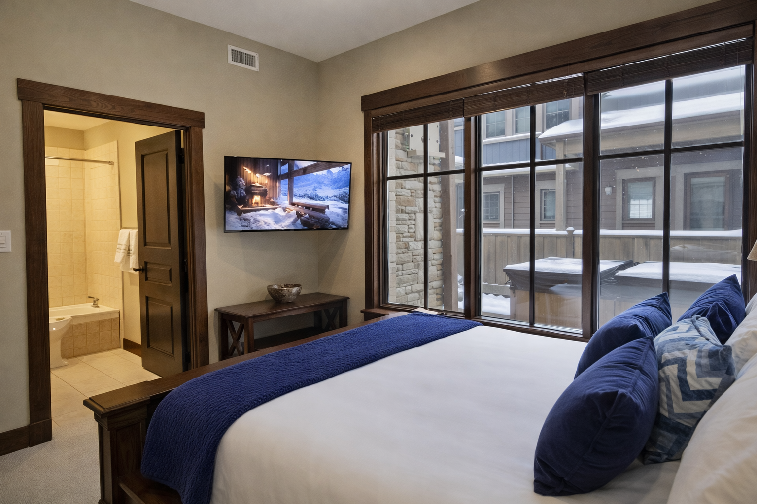 Drift off to sleep watching the snow fall outside your windows, with luxurious linens and a spa-style ensuite just steps away.