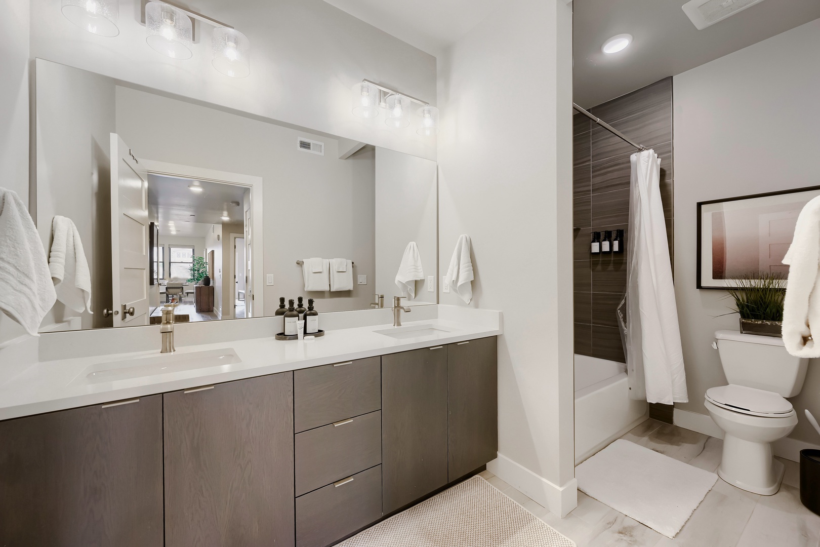 Large Vanity with Double sink and a full tub and shower
