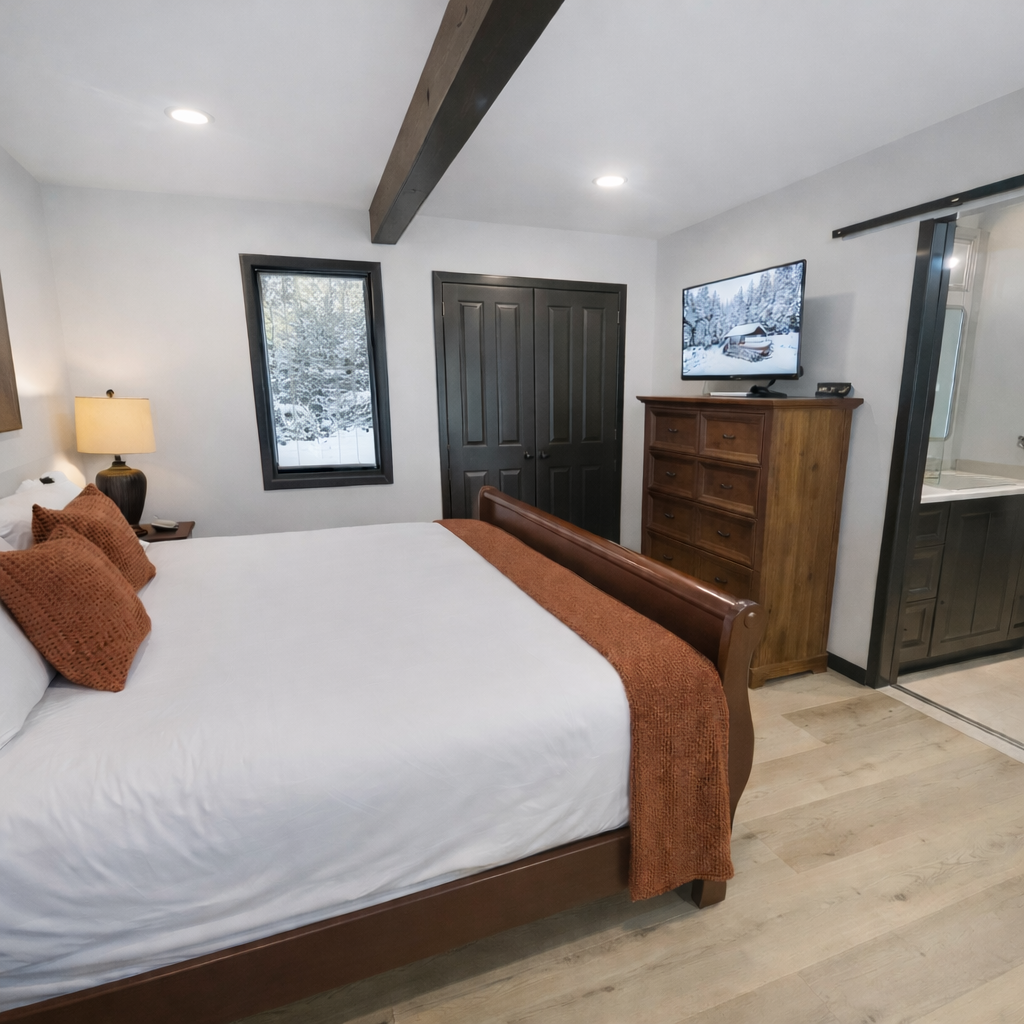 Rest peacefully in your elegant bedroom featuring a king bed, modern artwork, and private balcony access for morning coffee or evening relaxation.