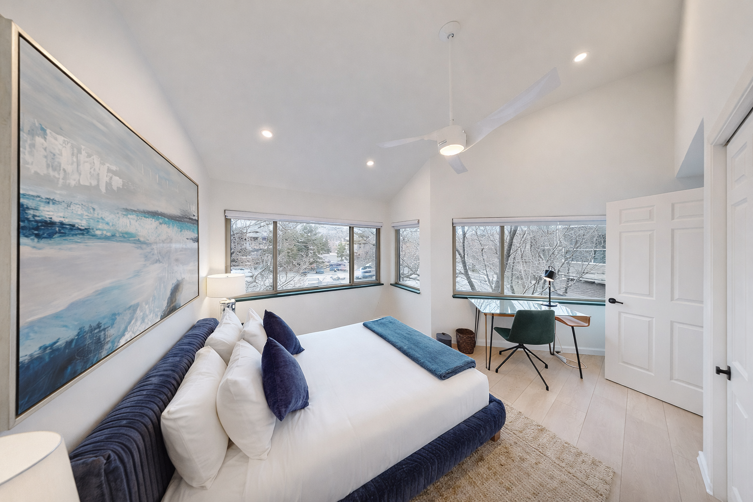 Unwind in our stylish, primary queen suite offering a comfortable bed, thoughtful amenities, and a tranquil ambiance for an ideal getaway.