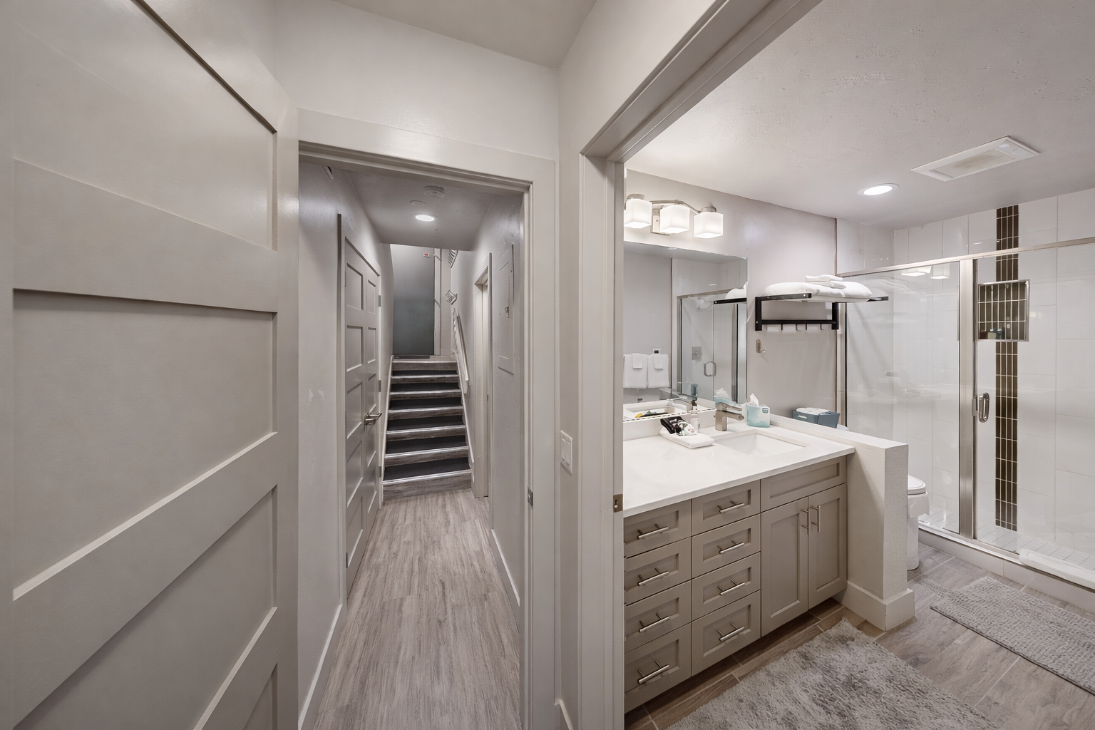 Bright and functional, this ensuite bathroom offers ample storage and contemporary finishes. Enjoy a serene, spa-like atmosphere perfect for prepping for your day or unwinding in the evening.