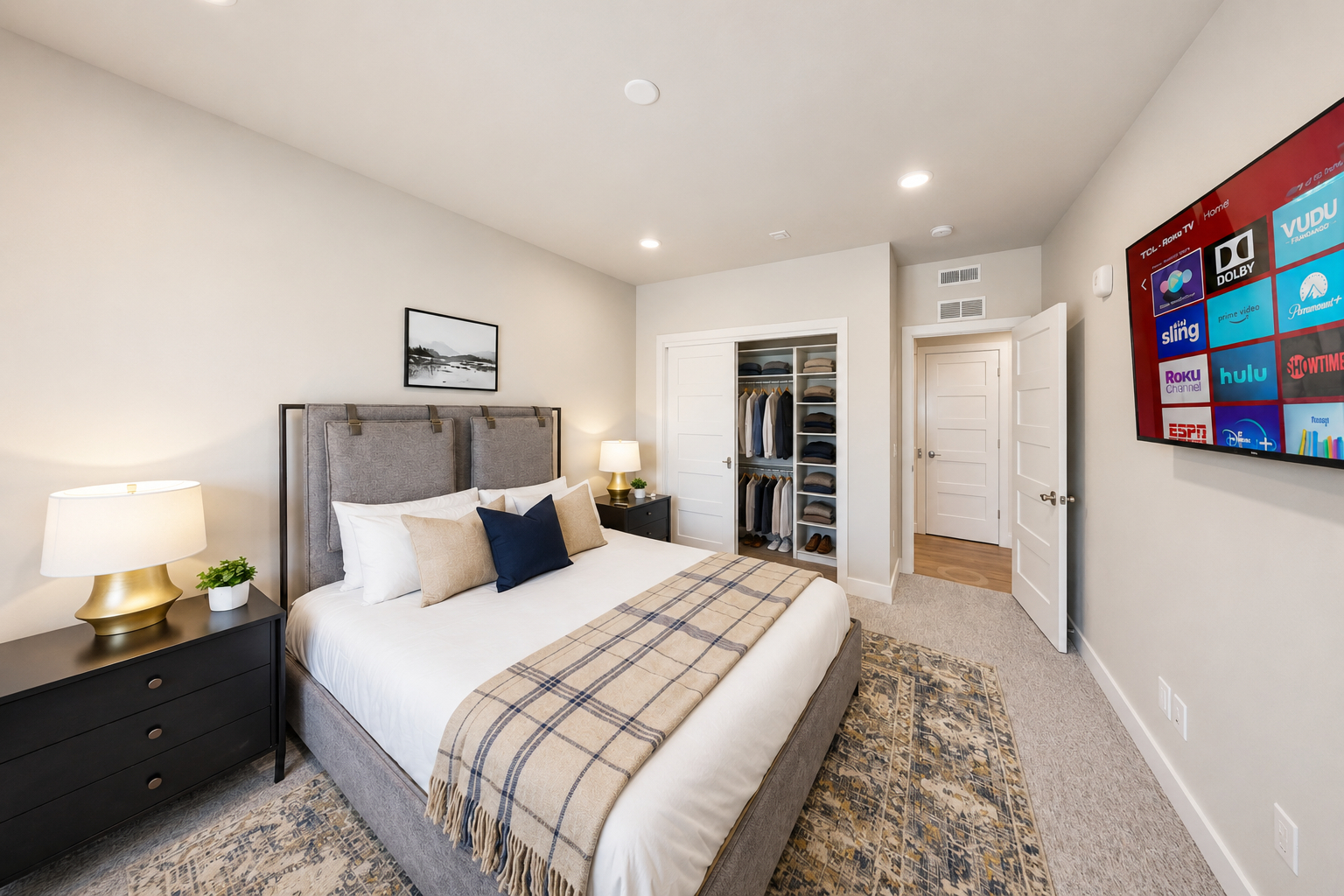 Sink into crisp linens and plush bedding after a day of exploring. Your bedroom offers an open closet for easy unpacking, a smart TV with streaming options, and thoughtful touches that make this space feel like home.