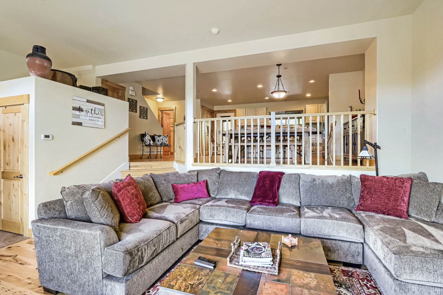 Sink into the plush sectional and feel instantly at home in this open, welcoming space designed for your group to gather and relax.
