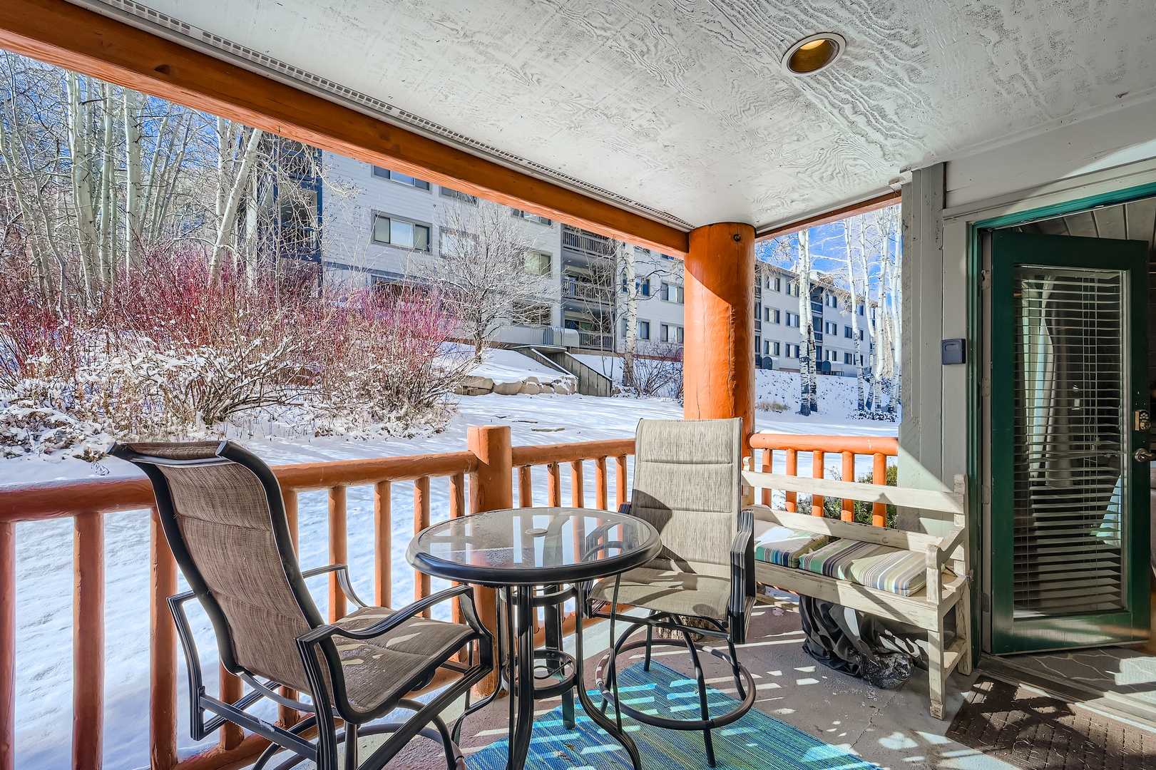 Step onto your private balcony where sunshine meets snowy mountain air. Sip morning coffee at your bistro table, wrapped in crisp alpine stillness and serene winter beauty.