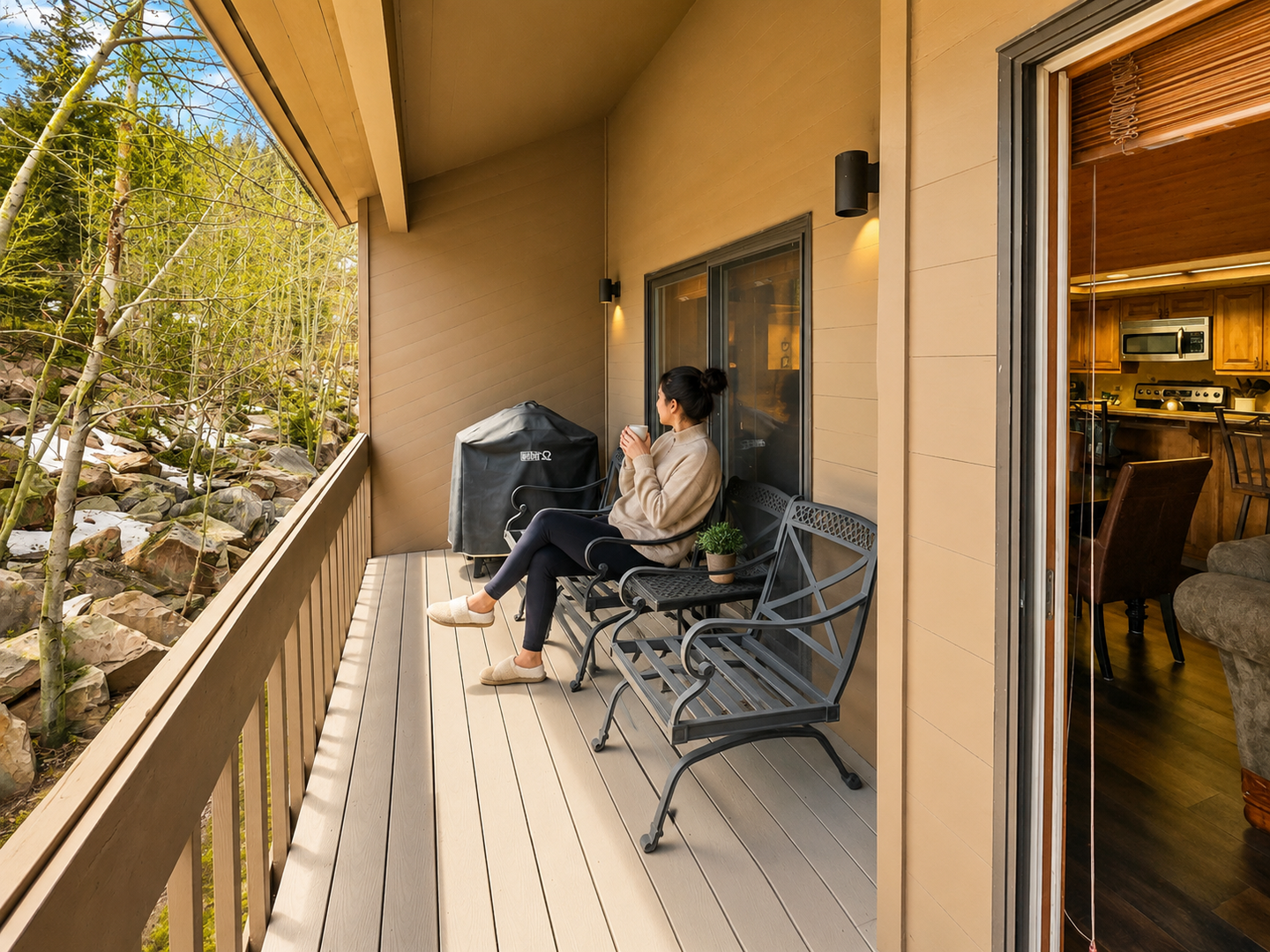 Enjoy the fresh air and peaceful views from our private deck. A BBQ grill and comfortable seating await for your outdoor relaxation and dining.