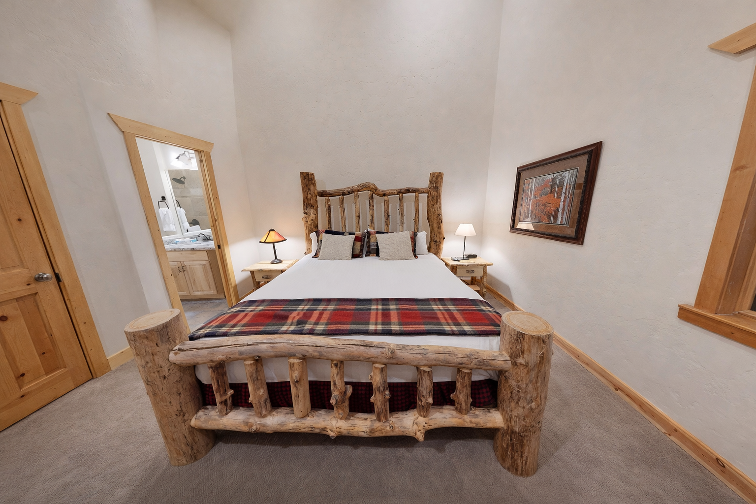 Drift into peaceful slumber in your rustic log bed, surrounded by warm wood tones and cozy mountain cabin charm.