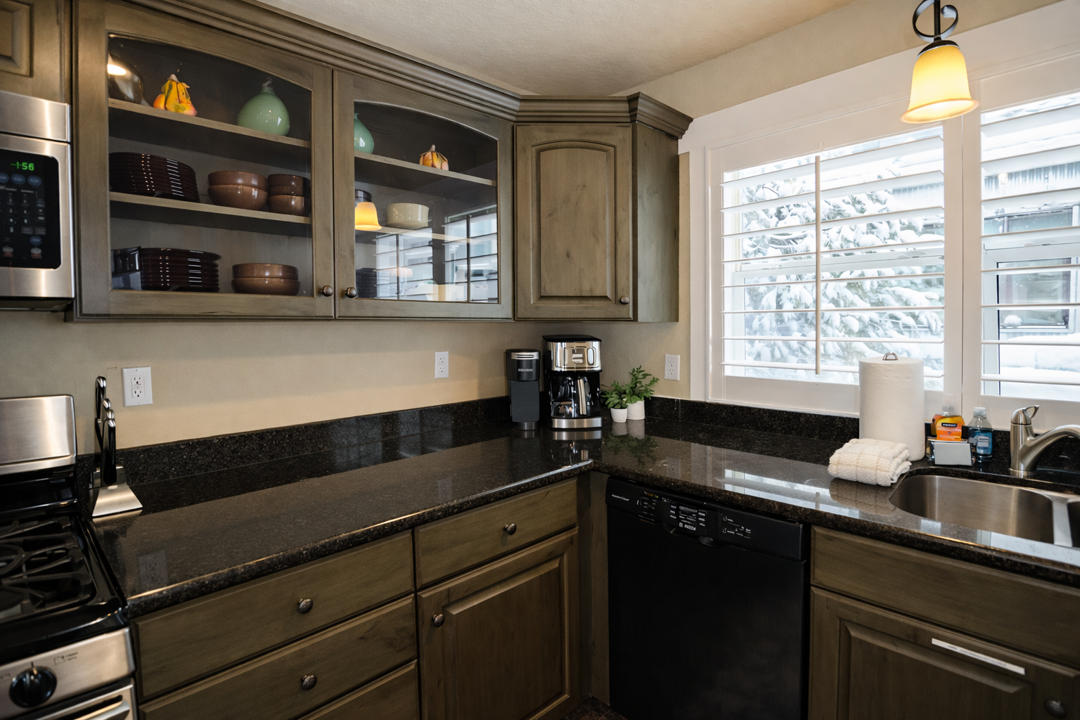 Your fully-equipped kitchen features granite counters and stainless appliances, perfect for preparing meals during your stay.