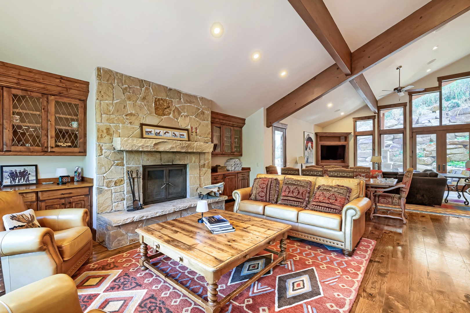 Living Room with Fireplace, Large Coffee Table, High Ceilings and lots of Light
