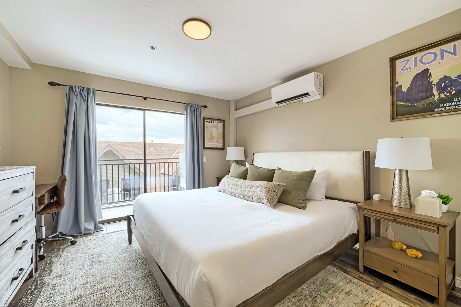 Sink into crisp linens and unwind in your serene bedroom, where soft lighting, a private balcony, and thoughtful touches create the perfect retreat after a day of adventure.