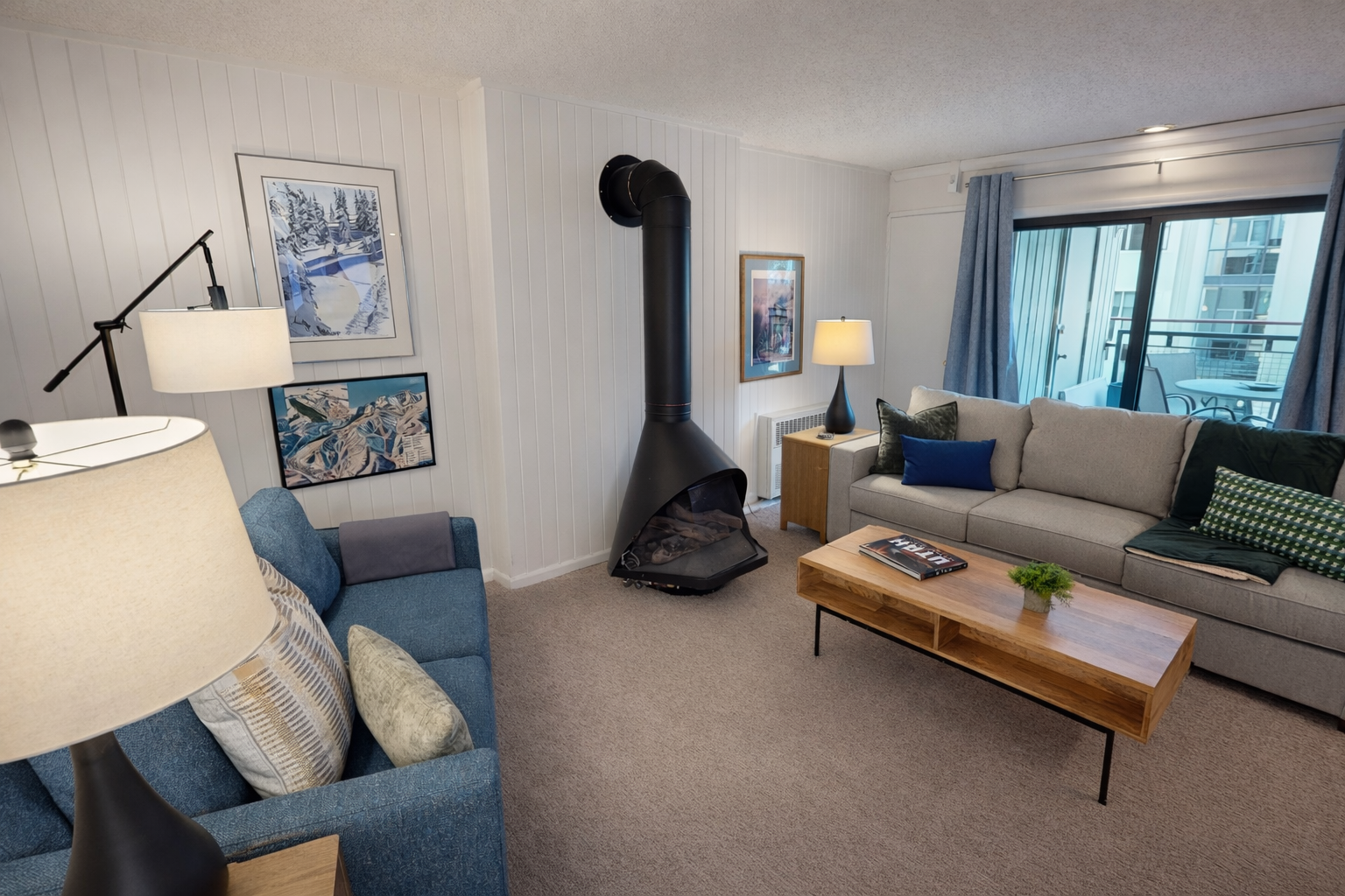 Unwind by the cozy fireplace in your stylish living room, where modern comfort meets warmth for perfect evenings.