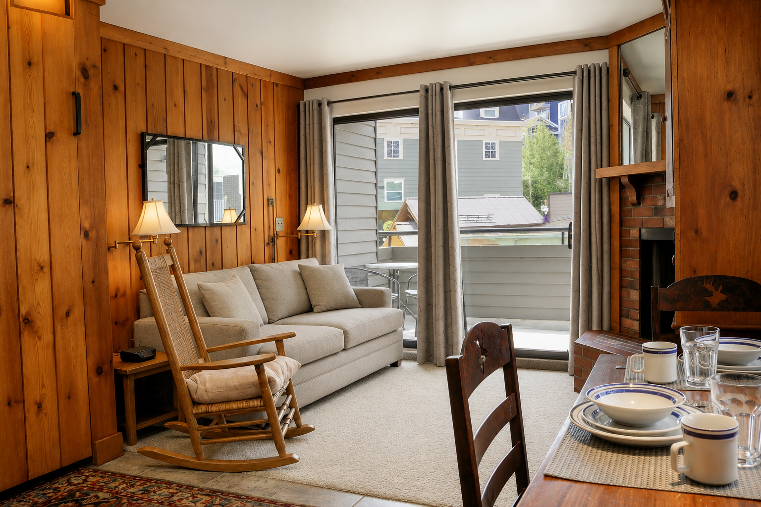 Settle into your cozy retreat with warm wood paneling, plush seating, and mountain light streaming through your private balcony. Picture yourself rocking by the fireplace after a day of adventure.