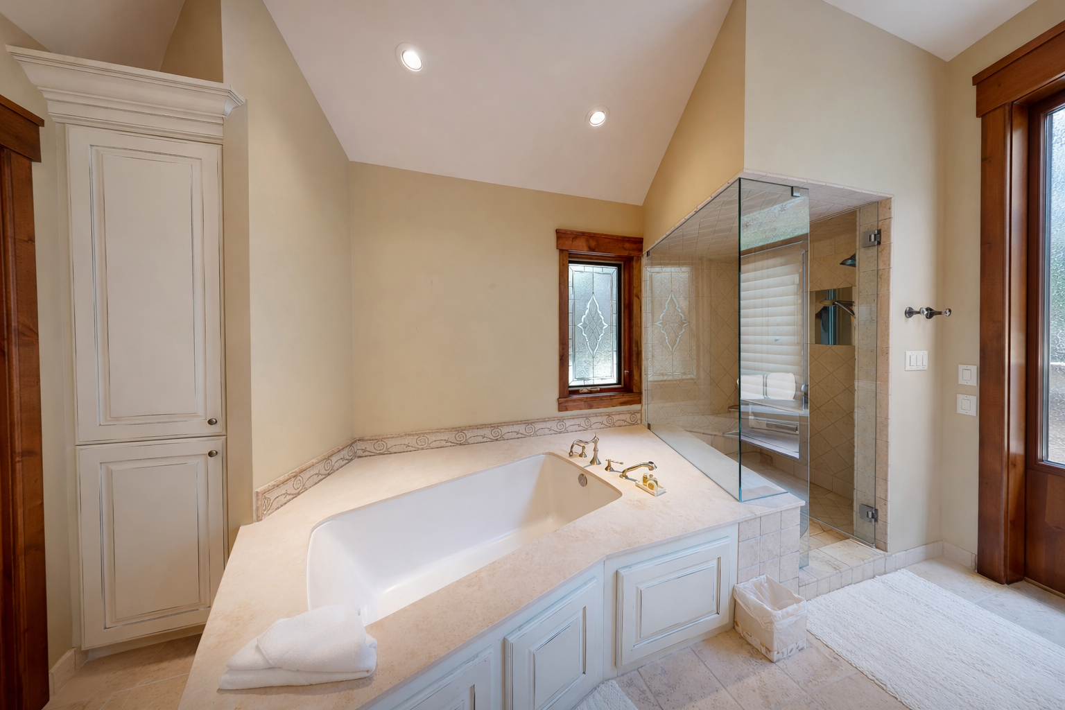 Soak away your stress in this luxurious soaking tub, then refresh in the elegant glass shower with natural light streaming through.