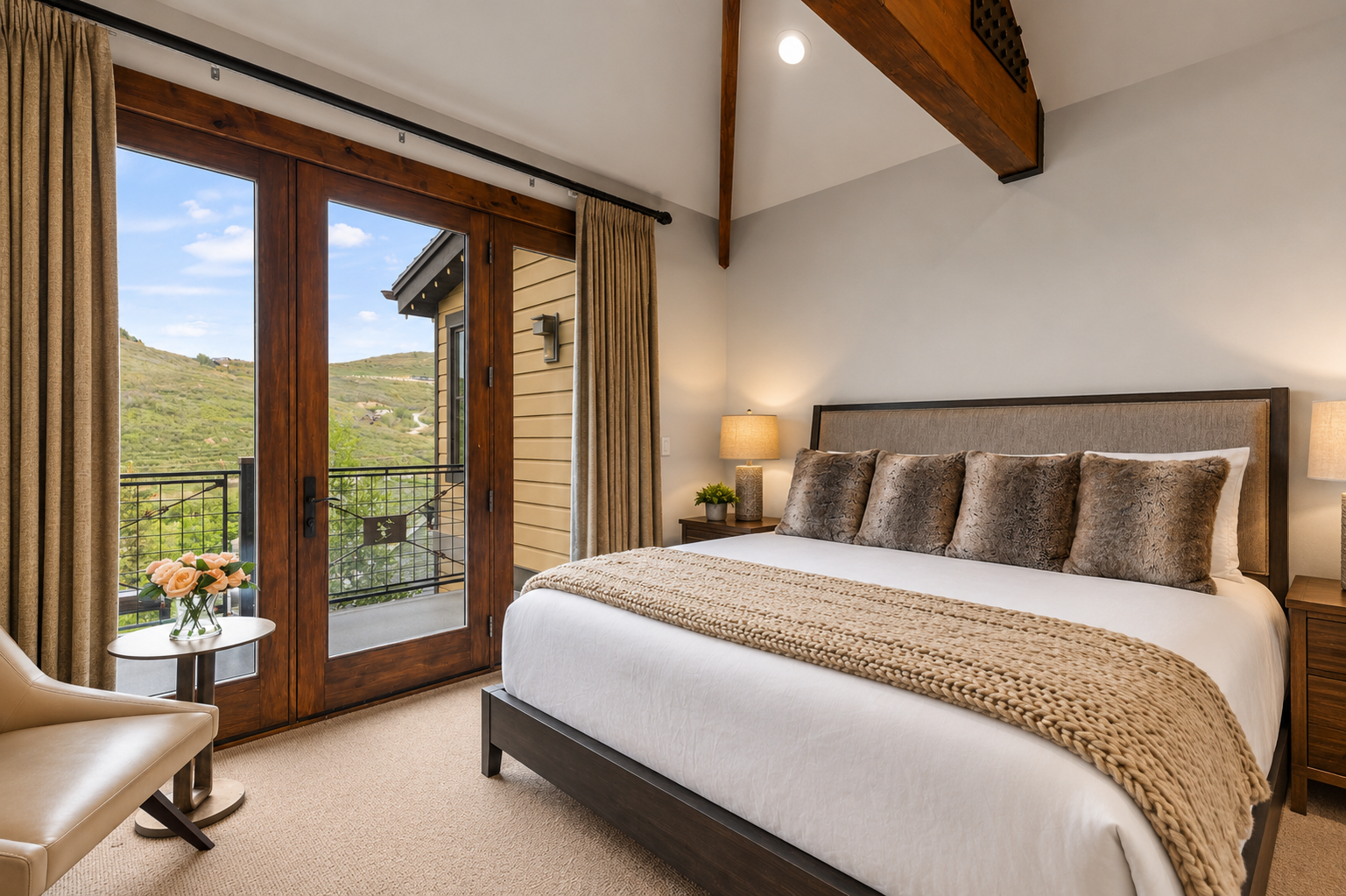Retreat to the elegant upstairs king suite with a plush king-size bed and private balcony access.