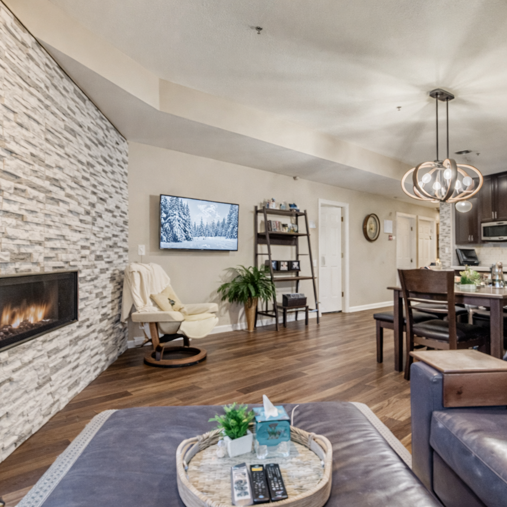 Relax in your stylish living space with a cozy fireplace, modern amenities, and comfortable seating perfect for unwinding after adventures.