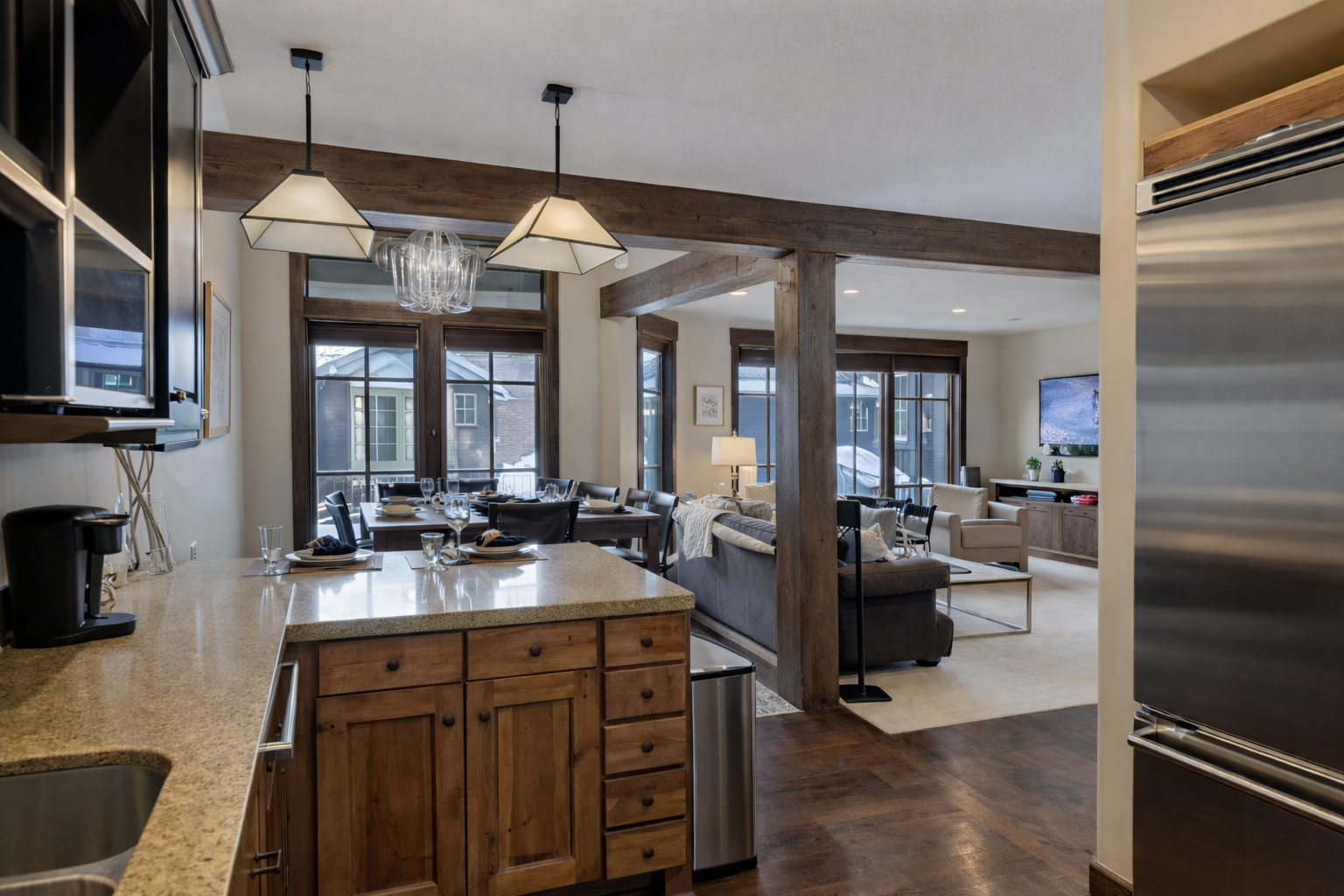 You'll love cooking in this chef-grade kitchen with granite counters, stainless appliances, and open flow to your cozy living space.