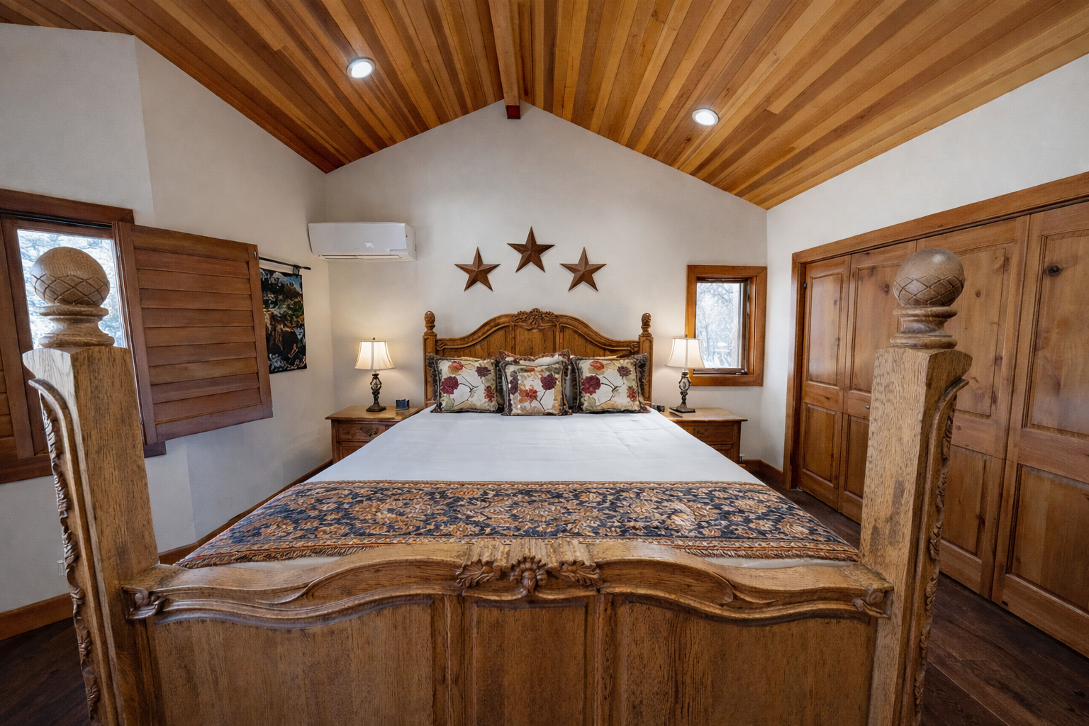 Unwind in your rustic sanctuary with stunning wood-beam ceilings and traditional furnishings that create the perfect cozy retreat.