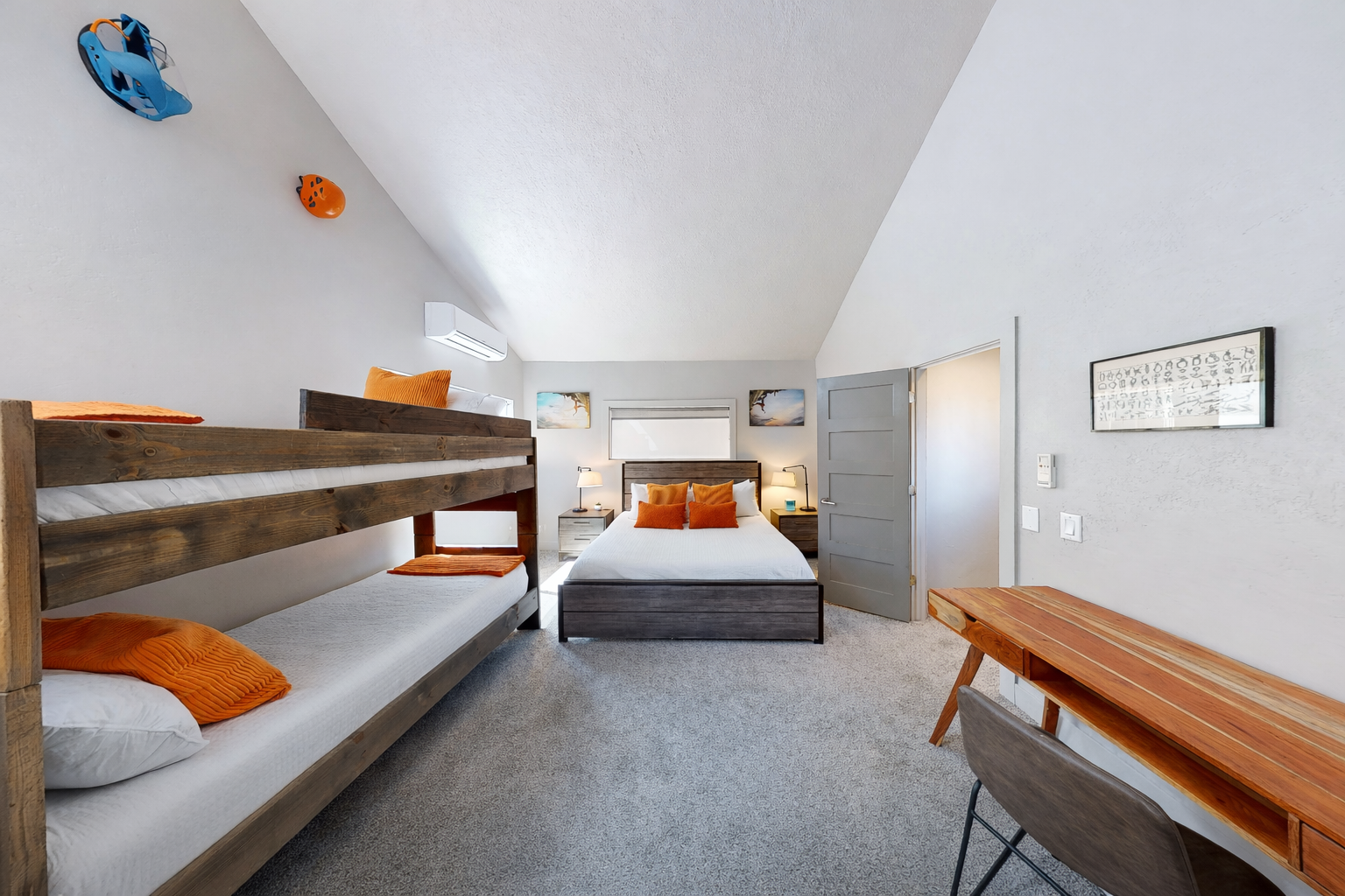 Perfect for families! This spacious guest suite features a plush king bed and a custom twin-over-twin bunk. A bright and airy retreat designed for ultimate comfort and flexibility.