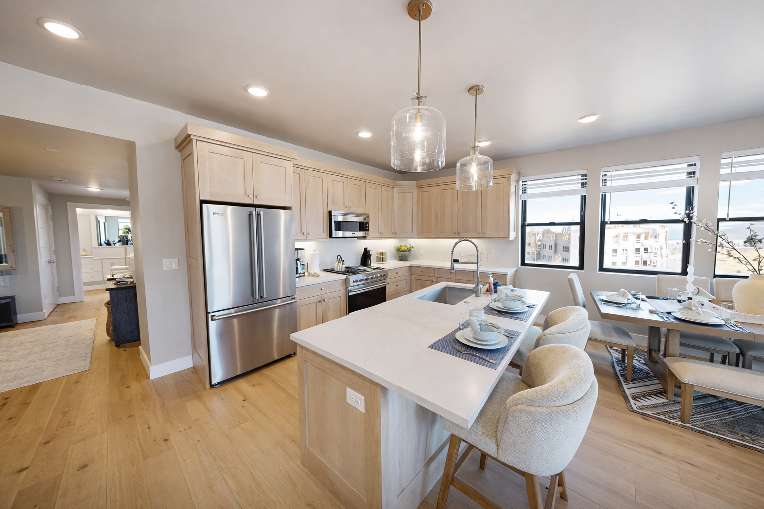 Your modern kitchen features sleek appliances and a spacious island where you can cook, dine, and gather with loved ones.