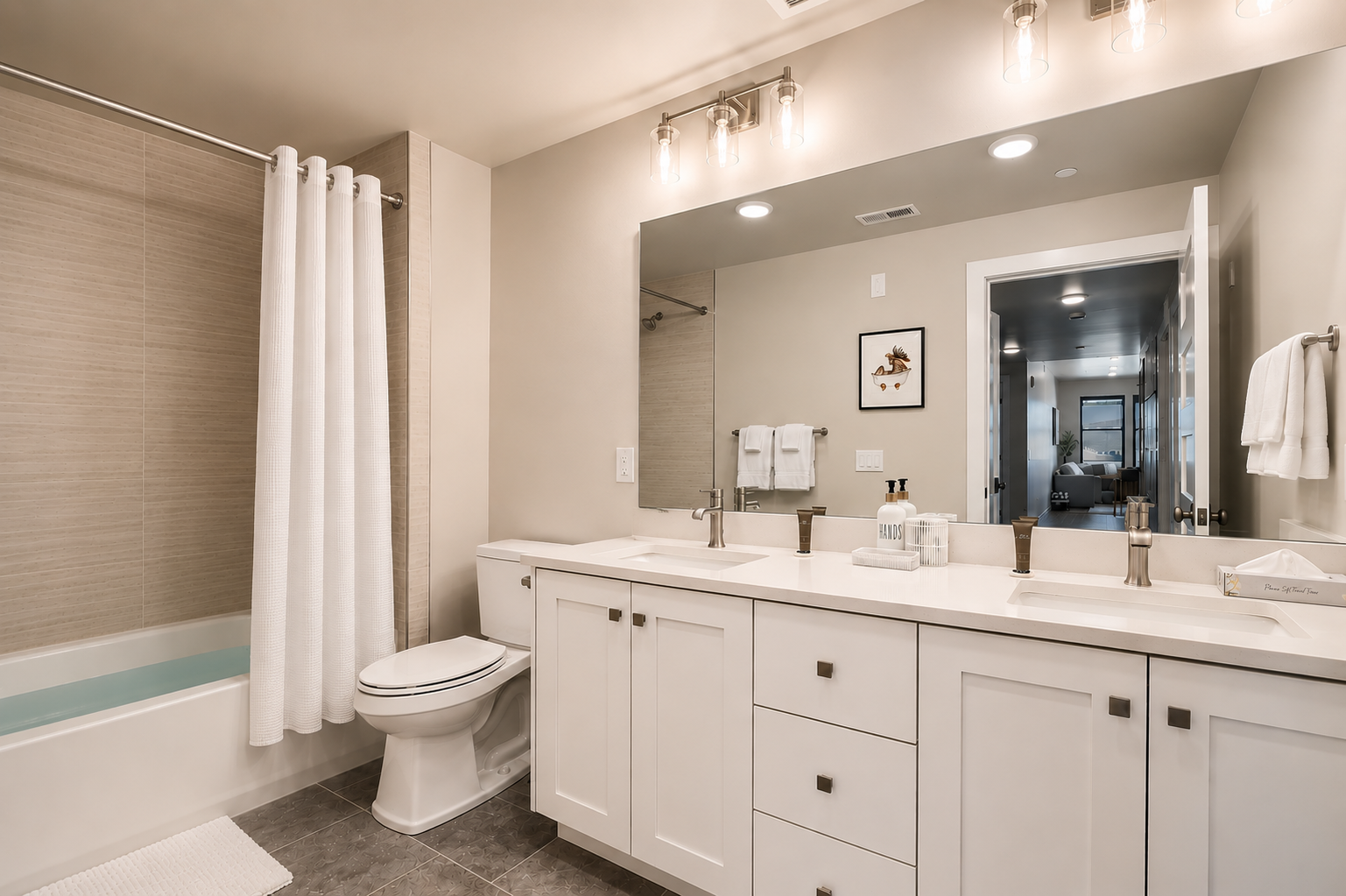 Step into your beautifully appointed bathroom with modern fixtures, dual vanities, and a relaxing soaking tub—your personal spa awaits.