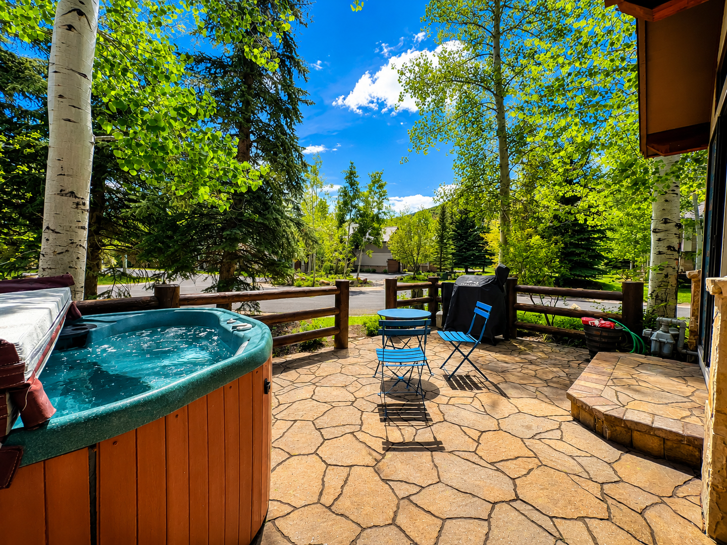 Relax in your private hot tub on this sunny patio, surrounded by towering aspens and evergreens. Unwind with a book, soak in the views, and let nature reset your spirit.