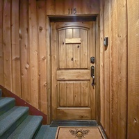 Welcome to your private mountain retreat through this charming wooden door. A cozy, inviting entrance awaits you for a relaxing and memorable stay.