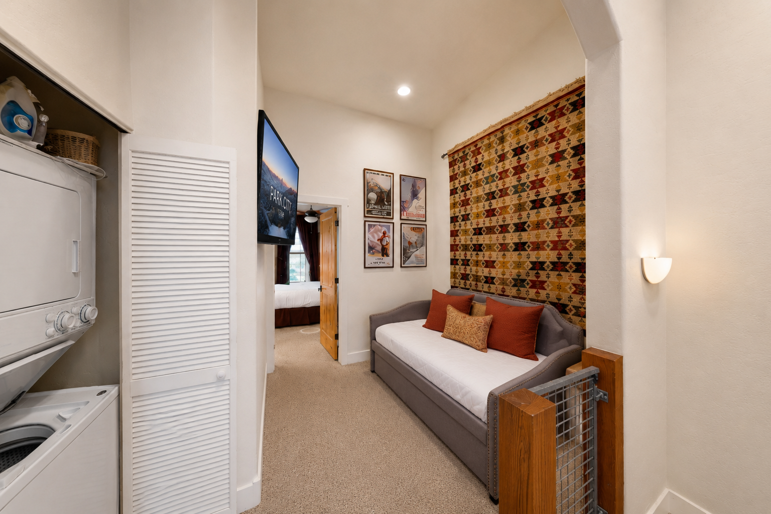 Bright and efficient, this sun-drenched landing offers a comfortable daybed and a clean, contemporary design. A thoughtfully curated retreat that provides a perfect spot for reading or relaxing.