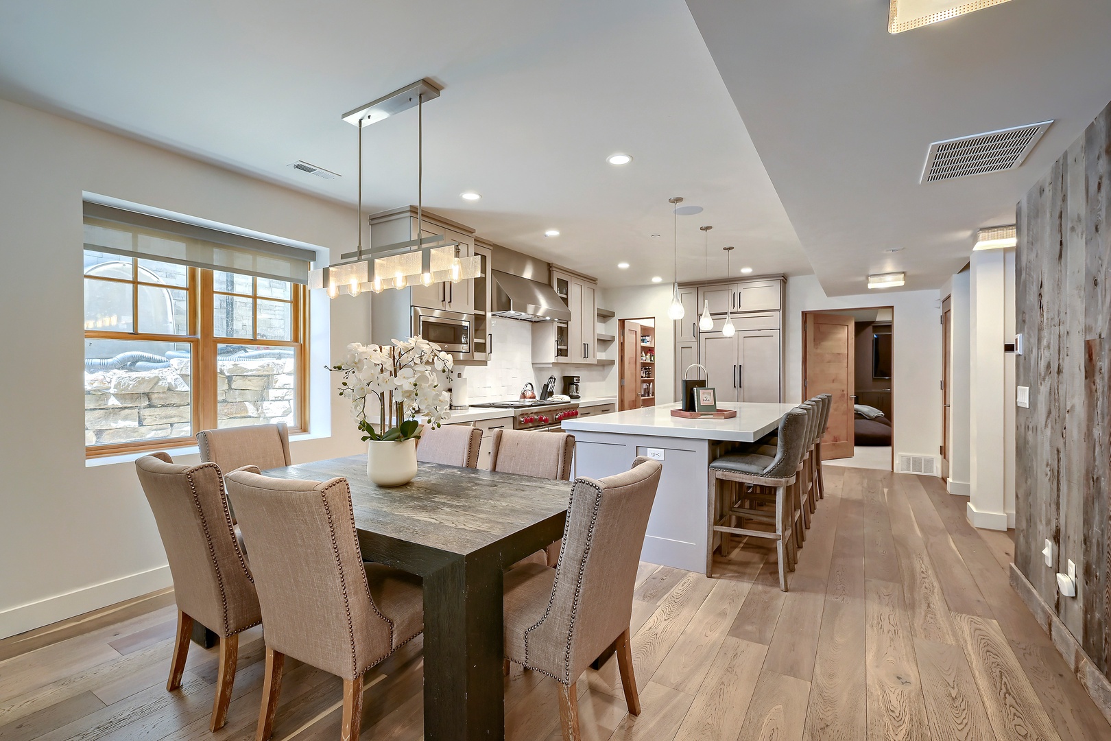 Your open-concept living space blends natural light, mountain breezes, and modern comforts—where every meal feels like a gathering and the kitchen invites you to cook, laugh, and savor your alpine escape.