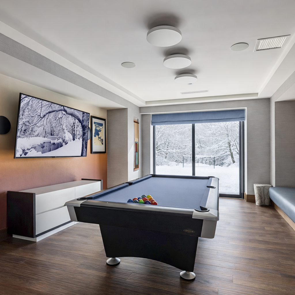 Challenge friends and family in the game room with a ping pong table and pool table. This entertainment area is perfect for post-slope fun in Park City.